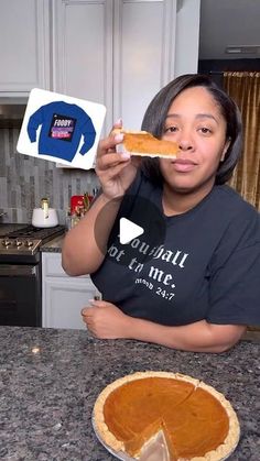 a woman holding up a piece of pie in front of her face