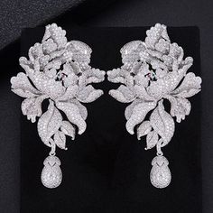 Item Type: Wedding Earrings Gender: Women Material: Cubic Zirconia, Diamond Size: 7.6 x 4.5 cm Earring Type: Drop Weight: 19 g / 0.04 lbs Package Includes: 1 Pair of Earrings Fringe Jewelry, Earring Wedding, Wedding Earrings Drop, Chrysanthemum Flower, Long Drop Earrings, Wedding Bridal Jewellery, Trendy Earrings, Peony Flower, Drop Earring