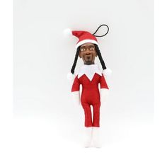 Deck the halls with Snoop Dogg in this one-of-a-kind, 4-inch molded Christmas ornament, capturing the iconic rapper's relaxed persona and festive spirit. More than just an ornament, it's a conversation starter. Imagine the smiles and surprised laughter as guests spot Snoop chillin' on your tree. The perfect gift for the Snoop Dogg fan in your life: Whether it's a die-hard music lover, a pop culture enthusiast, or someone who appreciates unique and humorous gifts, this Snoop Dogg ornament is sure to delight. Add some West Coast flavor to your holiday decorations with the Snoop on the Stoop Molded Christmas Ornament. Color: Red. Snoop Dogg Elf On The Shelf, Funny Ornaments Christmas, Snoop On The Stoop, Snoop Dog Christmas, Snoop On A Stoop, Ridiculous Gifts, Cool Christmas Gifts, Funny Christmas Presents, Hard Music