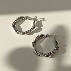 Not your usual basic hoops. Minimal modern design to add that extra edge to your look Cool silver metal finish to match the rest of your accessories FINE DETAILS Main material: Metal  Width: 2.5cm / 0.98" Length: 2.5cm / 0.98" Modern Silver Metal Hoop Earrings, Nickel-free White Gold Metal Hoop Earrings, Trendy Small Hoop Earrings In White Gold, Everyday White Gold Metal Hoop Earrings, Silver Metal Hoop Earrings, Modern Silver Hoop Earrings, Silver Hoop Crystal Earrings, Silver Hypoallergenic Metal Hoop Earrings, Trendy Silver Hoop Jewelry