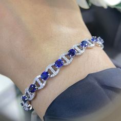 18K White Gold  Blue Sapphire and Diamond Bracelet.This shimmering fashion bracelet features 9.63 stunning oval traditional blue sapphires and 1.71ct in round cut diamonds.Set in Prong Setting,SI Clarity of diamonds. SDB019 NTJJ Loose Bracelet, Bracelet Stones, Blue Sapphire Bracelet, Blue Sapphire Jewelry, Diamonds Bracelet, Blink Blink, Diamond Bracelet Design, Mens Bracelets, Jewelry Design Drawing