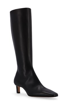 A slender square toe amplifies the modern appeal of a knee-high leather boot set on a cushioned footbed and modest block heel. 1 3/4" heel Side zip closure Leather upper and lining/synthetic sole Made in Portugal Alohas Boots, Black Long Boots, Long Black Boots, Boots Square Toe, Black Knee High Boots, Black Knees, Fall Winter Wardrobe, Knee High Leather Boots, Shoe Print