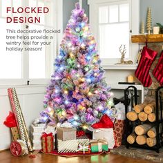 a decorated christmas tree with presents under it and the words, flocked design this decorative flocked tree helps provide a wintry feel for your holiday season