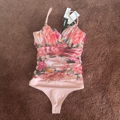 Nwt Express Spaghetti Strap Bodysuit Size Xs Feminine Pink Swimwear With Built-in Bra, Pink Stretch Swimwear With Spaghetti Straps, Pink Spaghetti Strap Stretch Swimwear, Pink Stretch Spaghetti Straps Swimwear, Pink Underwire Tankini For Summer, Pink Spaghetti Straps Swimwear, Pink Spring Tankini With Built-in Bra, Pink Fitted Tankini For Spring, Sleeveless Pink Lined Bodysuit