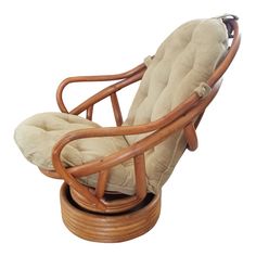 a wooden chair with a cushion on it