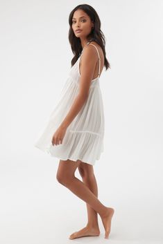 Complete your beach look with this flowy cover-up dress. It has a mini length fit and tiered detail. O'Neill Women's Cover-up dress Mini length Tiered skirt 100% Viscose Spring Beach Tiered Dress With Adjustable Straps, Flowy Breezy Tiered Dress, Spring Vacation Bohemian Tiered Dress, Flowy Ruffled Sundress For Beach Cover-up, Sundress Mini Dress With Adjustable Straps For Beach, Mini Dresses With Adjustable Straps For Beach Season, Chic Tiered Sundress For Beach, Spring Vacation Tiered Dress With Adjustable Straps, Summer Tiered Dress With Adjustable Straps For Day Out