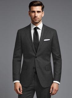 A quintessential staple in every discerning man's wardrobe is our Italian Turna Dark Gray Flannel Suit. Painstakingly crafted from pure wool fabric, it offers exceptional comfort in various weather conditions. With its dark gray tone and solid pattern, this suit effortlessly delivers a refined silhouette that exudes elegance and professionalism, making it a versatile year-round option for wherever your journeys take you.  Look features a 2 button jacket with notch lapels, horn royal black button Flannel Suit, Master Tailor, Grey Flannel, Flannel Jacket, Grey Tones, Black Button, Men's Wardrobe, Jacket Buttons, Wool Fabric