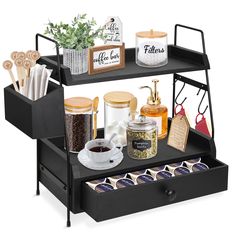 an assortment of kitchen items is displayed on a black shelf with drawers and utensils