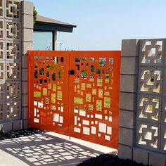 an orange gate that has been cut into squares