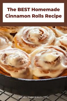 a pan filled with cinnamon rolls covered in icing