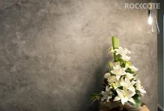 a bouquet of white flowers sitting on top of a table