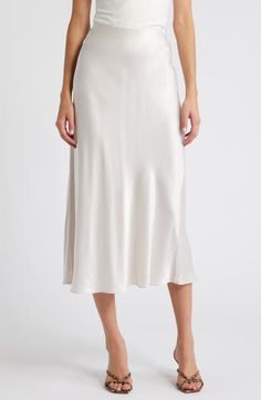 Put some slink in your step in this solid satin midi skirt fitted with a concealed-elastic waistband to help you move through your day with ease. 32" length (size Medium) Concealed-elastic waist Unlined 55% rayon, 45% viscose Dry clean Imported White Formal Midi Bottoms, Elegant Cream Skirt For Daywear, Classic White Midi Length Bottoms, White Midi-length Bottoms For Evening, White Midi Length Bottoms For Evening, Classic White Midi Bottoms, Elegant Daywear Skirt, Elegant Skirt For Daywear, Silk Skirt For Daywear