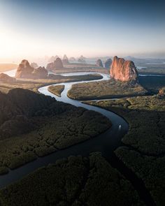 an aerial view of the river and mountains