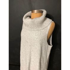 Elevate Your Wardrobe With This Stunning Talbots Sleeveless Knit Top In Natural Gray. The High-Quality Fabric And Impeccable Design Make It A Must-Have For Any Fashion-Forward Woman. The Top Is Available In Size Large And Is Perfect For Any Casual Or Formal Occasion, Adding A Touch Of Elegance To Your Look. The Top Is Brand New With Tags, Ensuring That You Get A Fresh And Unused Piece. It Features A Basic Style That Is Both Timeless And Versatile, Making It An Essential Addition To Your Wardrobe Gray Knit Sleeveless Sweater Vest, Fitted Sleeveless Gray Sweater Vest, Sleeveless Knitted Vest For Layering, Casual Cable Knit Sleeveless Tank Top, Fitted Gray Knit Sweater Vest, Knitted Sleeveless Vest For Layering, Sleeveless Knit Tank Top For Winter, Sleeveless Cable Knit Top, Sleeveless Cable Knit Vest