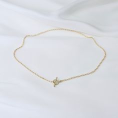 "14K Gold Toggle and Rolo chain necklace *The chain, toggle clasp and all components are 14K yellow gold (If you order a 16\" necklace, it will be a toggle clasp plus chain will be 16\".) The toggle clasp is about 12mm. 2.3mm Rolo chain Please read our policies before you place your order. https://www.etsy.com/shop/SashJewelry/policy?ref=shopinfo_policies_leftnav To see other Mother daughter necklace set click here: https://www.etsy.com/shop/SashJewelry?section_id=12441134&ref=shopsection_le Gold Link Toggle Necklace With Delicate Chain, Gold Minimalist Chain Link Toggle Necklace, Gold Minimalist Toggle Chain Link Necklace, Gold Chain Link Toggle Necklace In Minimalist Style, Dainty Gold Toggle Necklace With Lobster Clasp, Minimalist Gold Chain Link Toggle Necklace, Minimalist Gold Toggle Chain Link Necklace, Dainty Gold Toggle Necklace With Delicate Chain, Elegant Yellow Gold Toggle Necklace With Cable Chain