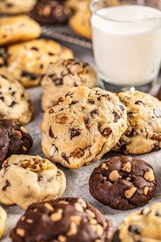 chocolate chip cookies and milk on a baking sheet