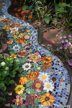 a garden path made out of colorful flowers