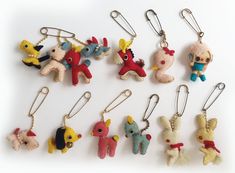 several different key chains with stuffed animals on them