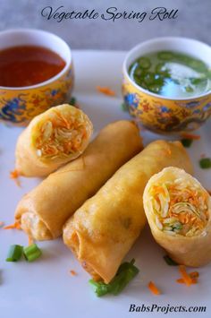 vegetable spring rolls with dipping sauce on the side