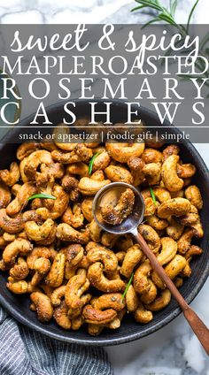 sweet and spicy maple roasted rosemary cashews in a skillet with a spoon