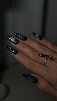 Spider Inspired Nails, Spiderweb Nails Coffin, Spiderweb Almond Nails, Purple Nails With Spider Web, Black Nails Acrylic Halloween, Punk Halloween Nails, Plum Halloween Nails, Halloween Nails With Glitter, Nails With Metallic Design