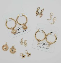 Choose a new charm to add or exchange to your existing gold hoops. Gold Charms With Removable Details For Everyday, Trendy Gold Charms Nickel Free, Trendy Gold Charms For Everyday, Trendy Gold Charms With Dangling Details, Everyday Gold Metal Charms, Trendy Everyday Gold Charms, Trendy Jewelry With Removable Dangle Charms, Gold Round Pendant With Removable Charms, Trendy Charms With Removable Details