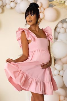 We just love this dreamy, ultra-feminine babydoll style maternity mini, babe. Expertly crafted in a delicate luxe woven fabric, our "Dolly Daze" mini dress is the epitome of girl-next-door chic. Super girly with a vintage feel, this style will make you well ahead of the fashion pack with its statement ruffle sleeves, bust-flattering neckline and thigh-skimming hem. Where to WearPerfect for your baby shower, weddings, date nights, and relaxing picnics with bae. We also love this dress for festivals. Style WithRock the festival look by teaming this dress with a floppy hat and oversized sunnies. Also looks gorge with strappy heels or flat sandals. Up the glam factor by adding delicate jewellery and a sparkly clutch. Underwear SolutionsLace Be Honest nipple coversProduct DetailsModel is 5’9 an Girly Maternity Outfits, Vestidos Para Baby Shower, Sparkly Clutch, Delicate Jewellery, Babydoll Mini Dress, Club L London, Picnic Dress, Black Dress Prom, Ultra Feminine