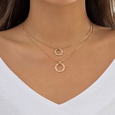 Description:Dainty Layered Metallic Halo Pendant Chain Necklace SetSpecification:Size: 13.8" - 15.7" Weight: 0.36 oz/setMaterial: copperColors: gold/silverFeatures and Details:This layered halo pendant choker necklace set is made of nickel-free. lead-free. cadmium-free and hypoallergenic materials. which will not turn your skin green or cause anaphylactic reaction.This gift for her chain necklace set is decorated with unique design and superb craftsmanship to create special piece that can satisf Gold Alloy Chain Necklace, Gold Chain Necklace In Alloy, Gold Necklace In Alloy, Rose Gold Delicate Chain Necklace, Delicate Rose Gold Metal Chain Necklace, Gold Alloy Charm Choker Necklace, Gold Alloy Choker Charm Necklace, Dainty Gold Alloy Charm Necklaces, Gold Alloy Chain Choker