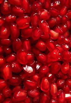 red pomegranates are shown in close up