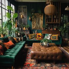 a living room filled with green couches and lots of potted plants on top of them