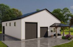 a white garage with a black roof and two doors