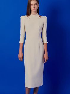 This is a modern and feminine dress by IvanaHelsinki that is made out of high quality and sturdy material. With distinctive mood of the design and comfortable wear, you can style it for your modern daily outfit.- Light high density wool like fabric- H line silhouette- Layered design and slim waist Elegant Fitted Midi Dress For Winter, Flattering Long Sleeve Formal Midi Dress, Long Sleeve Midi Dress With Structured Shoulders For Work, Elegant Sheath Dress For Winter, Workwear Midi Dress With Structured Shoulders And Long Sleeves, Spring Midi Dress With Structured Boning, Chic Structured Dress, Chic Fitted Winter Midi Dress, Fall Evening Dress With Structured Boning