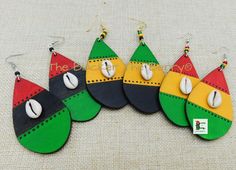 The handmade, hand painted and TBTB designed earrings are 3 inches long. There are three selections the RBG which are the red, black and green. The Jamaica flag colors which are the green, yellow and black.. The Rasta earrings are red, yellow and green. These are lightweight and coated for protection. They are black on the back. If you have any questions about this piece please feel free to contact us at anytime. Our products are not intended for babies or children as we use small pieces, wires Jamaica Women, Rasta Earrings, African Christmas, Teardrop Jewelry, Jamaica Flag, African Accessories, Loc Jewelry, African Earrings, Paper Earrings