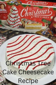 christmas tree cake cheesecake recipe on a plate next to a box of christmas trees