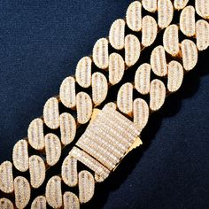 Elevate your style with our 21mm All Over Baguette Cuban Link Chain, a masterpiece of luxury craftsmanship. This stunning chain features a captivating design adorned with dazzling baguette stones throughout, exuding opulence and sophistication. Perfect for those seeking to make a bold fashion statement, this chain is meticulously crafted to add a touch of elegance to any ensemble. Discover the epitome of luxury jewelry and redefine your style with this timeless accessory. Product Type: Necklaces Baguette Bracelet, Miami Cuban Link, Cuban Link Chain Necklaces, Clive Christian, Laura Geller, Cow Boy, Copper Chain, Cuban Link Chain, Timeless Accessories