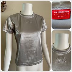 For your consideration Vintage Liz Claiborne metallic silver top. Embossed USA logo. Poly nylon Lycra spandex blend. Made in USA. Marked PETITE SMALL Fits like a modern women's XS/S Pre owned, shows general wear. Overall great shirt. Does show minor snags and surface wear throughout. The bottom hem has a small area where the stitch is missing, but it still wears fine. Please review photos to best determine condition and message with any questions. Zoom for details. Shown on size small mannequin Fitted Punk Style Party T-shirt, Y2k Crew Neck Tops For Club, Alternative Style Short Sleeve Summer Tops, Y2k Short Sleeve Tops For Alternative Fashion, Grunge Crew Neck Party Top, Grunge Crew Neck Top For Party, Fitted Crew Neck T-shirt For Club, Y2k Short Sleeve Club T-shirt, Fitted Short Sleeve Alternative Tops