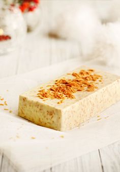 a bar of soap sitting on top of a white table