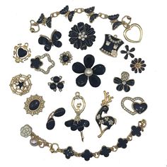 a collection of black and gold jewelry