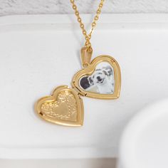 Heart locket necklace is the perfect gift for anyone who wants to keep their loved ones close to their heart. It features a heart-shaped locket that can hold a photo or memento of a loved one, allowing you to keep them close to your heart. It's a great gift for any occasion, like birthdays or Valentine's Day, and can even be personalized by engraving it. Heart Locket Necklace is a must-have addition to any jewelry collection, thanks to its exquisite design and sentimental value.  💬 Please send us your image via direct messages. 📣 Additional information about the product 👉 Material: Stainless steel 👉 Finish: Silver, Gold 🎁 Comes with a gift box Mother's Day Heart Locket Necklace With Hallmark, Personalized Heart Medallion Necklace For Anniversary, Personalized Medallion Locket Necklace For Mother's Day, Keepsake Medallion Locket Necklace With Hallmark, Personalized Medallion Heart Necklace For Anniversary, Mother's Day Personalized Medallion Locket Necklace, Double Heart Locket Necklace For Mother's Day Anniversary, Engraved Locket Necklace For Valentine's Day, Valentine's Day Gift Locket Necklace With Round Pendant