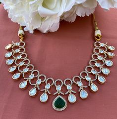 Exquisite tyaani inspired uncut polki necklace set. #statementjewelry #fashion #trendy #weddingseason #jewelry #weddingjewelry #fashionjewelry #kundanjewelry #punjabiwedding #indianwedding #diljitdosanjh #punjabijewelry #india #pakistan #canada #vancouver #toronto #brampton #usa #california #bayarea #sanfrancisco #texas #dallas #houston #newyork #chicago #sanantonio #florida #gehnagalleryusa Designer Kundan Chandbali Necklace, Designer Chandbali Kundan Necklace With Cutdana, Bollywood Style Kundan Temple Necklace For Designer Wear, Bollywood Style Kundan Temple Necklace, Designer Kundan Jewelry With Gota Work, Designer Kundan Bridal Necklace With Intricate Design, Kundan Jewelry With Gota Work For Designer Wear, Designer Kundan Temple Necklace With Chandbali Shape, Kundan Temple Jewelry Necklace For Designer Wear