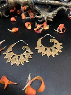 Hoop Earrings with cut-out Design, Brass, hinged clasp. Perfect for your Collection of accessories. Circumference: 1 1/4" Open studio most days from 10:00 to 5:00, DM, make an appointment to have an adventure in shopping. Yes ~ along with basic simplicity, It's all about you You deserve to know about my fabulous Treasure chest. Tribal Jewelry, Statement Piece Handmade Jewelry, Art to Wear, with Much Much More. Looking for more Treasures, Or would like to purchase, let your fingers do the shopping xoxo On My ETSY HeartbeatHandmade https://www.etsy.com/shop/HeartbeatHandmade Gold Hoop Earrings With Pierced Copper, Symbolic Round Pierced Hoop Earrings, Bronze Hoop Pierced Earrings, Artistic Metal Hoop Earrings Nickel Free, Artistic Nickel-free Metal Hoop Earrings, Symbolic Round Metal Hoop Earrings, Unique Metal Hoop Earrings, Pierced Copper Hoop Earrings, Small Hinged Hoop Earrings As Gift