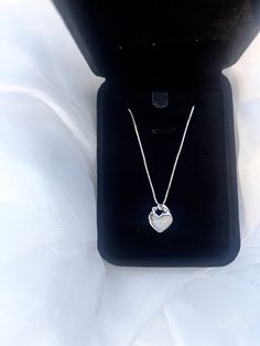 "This handmade breastmilk necklace is a truly unique and special piece of jewelry. Made with your own breastmilk, ( or formula), it is a beautiful reminder of the incredible bond between a mother and her child. The breastmilk is carefully preserved and encapsulated in resin, creating a stunning focal point for the ring. The setting is made of high-quality, durable materials, ensuring that this ring will last for years to come. Whether worn for special occasions or as an everyday accessory, this breastmilk ring is sure to become a treasured keepsake. Each one is custom-made to order, making it a truly personalized and meaningful gift for any mother. Please allow up to a month to receive your item as I order the ring AFTER you order and make it once it arrives to me. ❤️ If you take a few wee White Heart Necklace With Clavicle Chain As Gift, White Heart Clavicle Chain Necklace As Gift, Delicate Mother's Day Keepsake Necklace, White Sterling Silver Heart Necklace With Clavicle Chain, Mother's Day Keepsake Jewelry With Initial Pendant, Mother's Day Keepsake Initial Pendant Jewelry, Sterling Silver Locket Jewelry As Gift For Mom, Minimalist White Keepsake Necklace, Hypoallergenic Necklace For Valentine's Day Keepsake