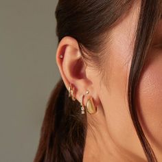 The Gold Dome Huggie Earring is a unique spin on a traditional huggie, thanks to its dome-like silhouette. Crafted from 14k gold, this huggie is perfect for everyday wear and looks just as good in the lobe as it does higher up the ear. Gold Teardrop Huggie Earrings Fine Jewelry, Yellow Gold Dangle Huggie Earrings Fine Jewelry, 14k Gold Teardrop Hoop Earrings With Polished Finish, 14k Gold Huggie Earrings For Everyday Fine Jewelry, 14k Gold Huggie Earrings For Everyday, Everyday Fine Jewelry 14k Gold Huggie Earrings, Everyday 14k Gold Huggie Earrings Fine Jewelry, Minimalist 14k Gold Teardrop Huggie Earrings, 14k Gold Teardrop Huggie Earrings Fine Jewelry