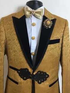 Our new gold, floral print, three piece tuxedo will be an excellent addition to your formal wardrobe. It's luxurious velvet collar will sport a look of elegance that all will notice. This tuxedo includes beautiful button covers, matching cufflinks, and a stunning bow tie. Luxury Gold Evening Blazer, Gold Tailored Tuxedo For Formal Occasions, Royal Fitted Tuxedo For Formal Events, Royal Fitted Tuxedo For Formal Occasions, Elegant Tailored Gold Tuxedo, Elegant Gold Tailored Tuxedo, Elegant Gold Tuxedo For Festive Occasions, Luxury Gold Tuxedo For Semi-formal Occasions, Luxury Gold Tailored Tuxedo