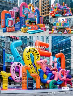 an assortment of inflatable letters and numbers are displayed on the side of a building