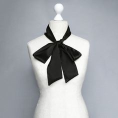 The black silk hand-made skinny scarf This black silk bow tiу adds a silky, sophisticated accent for year-round wear. The bow tie is a perfect way to accentuate simple clothes to look smart The necktie is produced from 100% silk. Sizes: Width: 8 cm / 3.14 inches Length: 177 cm / 70 inches Handmade item The product manufacturing takes 1-3 working days Please note that the color may slightly vary due to photographic lighting sources or your monitor settings. Check my other listings to see more siz Satin Silk Scarf Gift, Black Silk Scarf For Party, Silk Scarves Perfect For Gifts, Elegant Silk Scarves With Satin Finish, Elegant Silk Scarf With Satin Finish, Formal Satin Scarves With Satin Finish, Classic Silk Scarf As A Gift, Classic Satin Scarves As Gift, Elegant Satin Silk Scarf As A Gift