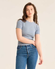 Made from soft, ribbed pima cotton with a touch of Spandex, this flattering tee works solo or layered under a sweater or shirt. Classic baby tee style, with a fitted silhouette and a shorter length. Features a crew neck with a slight scoop. 96% cotton/4% spandex. Imported. | WOMEN'S PIMA COTTON BABY TEE Fitted Basic Ribbed T-shirt, Basic Ribbed Short Sleeve Top, Trendy Ribbed Short Sleeve Top For Everyday, Cotton Crew Neck Top With Ribbing, Blue Ribbed Top With Relaxed Fit, Blue Ribbed Tops With Relaxed Fit, Trendy Fitted T-shirt With Ribbed Neckline, Classic Fitted T-shirt For Fall, Cotton Ribbed Tops For Layering