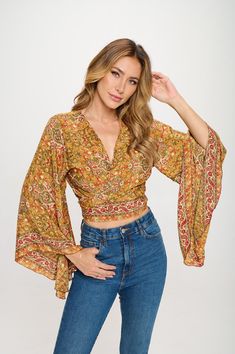 Handmade unique crop top.  Best for music festivals, beach, and casual.  Fits Sizes XS/S/M/L/XL/XXL Fitted V-neck Top For Festival, Summer Hippie V-neck Top, Trendy V-neck Crop Top For Beach, Summer Beach Wrap Crop Top, Printed V-neck Crop Top For Summer, Summer Festival Wrap Blouse, Trendy V-neck Crop Top For Vacation, Summer Hippie Wrap Blouse, Flowy Wrap Tops For Summer