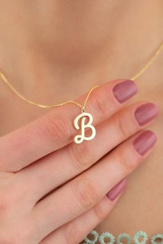 "Elevate your style with our Dainty Initial Necklace--a personalized touch that speaks volumes. Choose your initial or that of a loved one, beautifully crafted in delicate and high-quality materials. The minimalist design exudes sophistication, making it a versatile accessory for any occasion. This necklace adds a touch of individuality to your ensemble. Whether a meaningful gift or a cherished keepsake, our Dainty Initial Necklace is a timeless treasure that celebrates the uniqueness of each we Customizable Minimalist Initial Necklace, Initial Pendant Necklace With Name For Her, Elegant Initial Necklace Gift For Her, Elegant Custom Name Initial Necklace Gift For Her, Elegant Letter Charm Necklaces For Personalized Gift, Elegant Letter Charm Necklace For Personalized Gift, Minimalist Personalized Initial Necklace For Bridesmaids, Delicate Initial Pendant Name Necklace As Gift, Personalized Delicate Initial Necklace For Gift