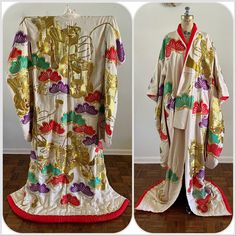 "For your consideration Heavily embroidered colorful vintage wedding kimono with vibrant red lining. Tag on inner sleeve. Multicolor butterfly/moth design with flower carts. Lots of gold threading. Quilted bottom hem. Pre owned, shows general wear. Overall good used condition. Presents beautifully, but does have flaws - sold AS IS. There is discoloration/yellowing, pinholes and surface wear/snaggy bits in areas throughout. Some hanger creases from storage/display. The discoloration is mainly nea Wedding Kimono With Floral Embroidery, Traditional White Kimono For Festive Occasions, Vintage Red Kimono For Wedding, Vintage Long Kimono For Wedding, Red Long Kimono For Wedding, Long Red Kimono For Wedding, Traditional White Kimono With Floral Embroidery, Traditional Embroidered Kimono For Tea Ceremony, Vintage Wedding Kimono With Kimono Sleeves